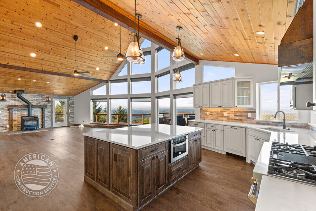 Open floor plan with vaulted great room and kitchen - home remodel by American Construction Services, Corp.