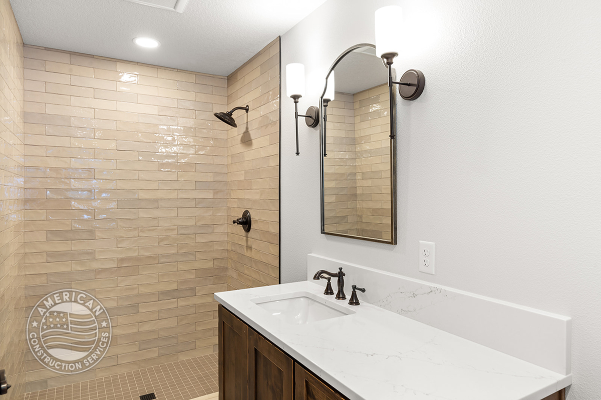 Bathroom with step-in shower, remodeled by American Construction Services, Corp.